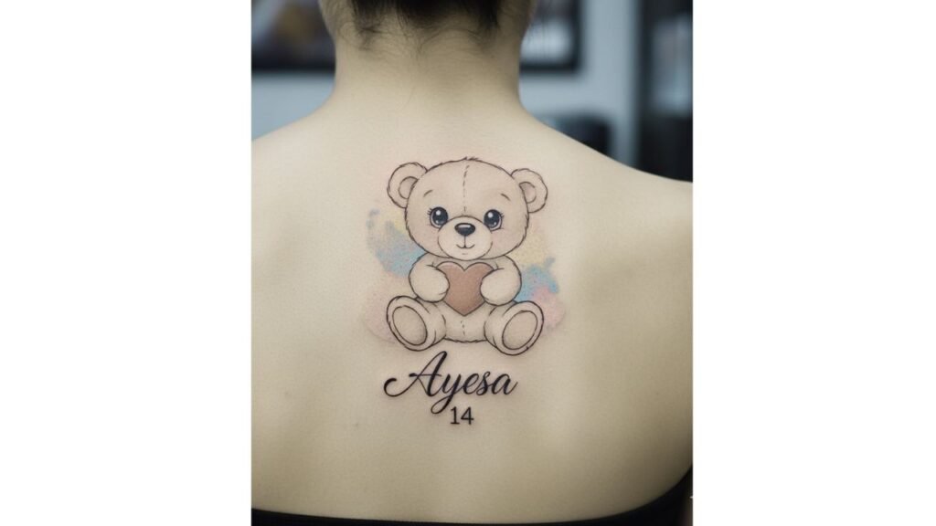 Baby teddy bear tattoo symbolizing innocence, comfort, and parental love with a cute and playful design.