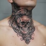 Eagle and skull neck tattoo design symbolizing strength, courage, and resilience in a bold masculine style.